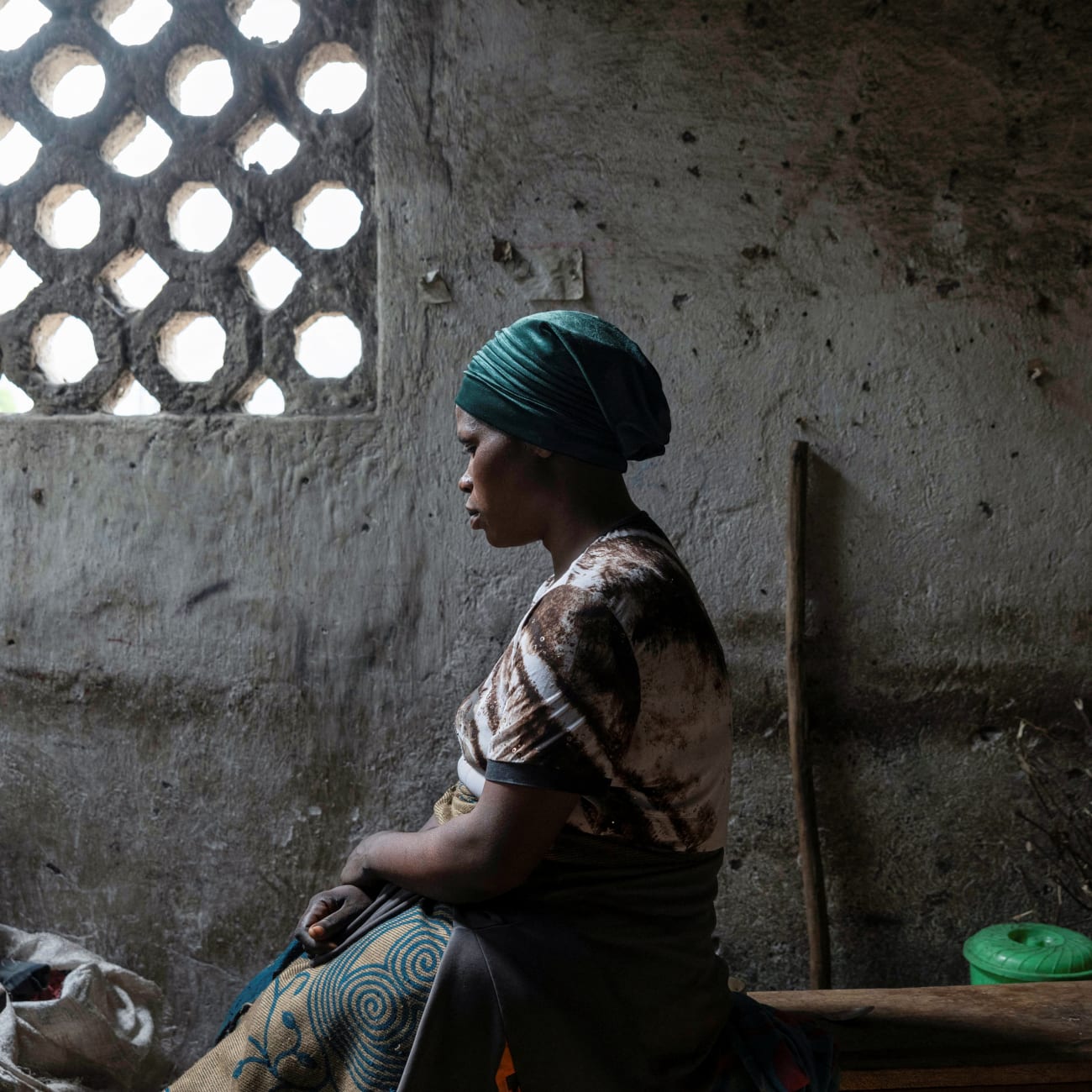 Florence Mushimye poses for a portrait in a classroom where they are taking refuge after being asked to leave Kalenga village by the M23 rebels, in Sake, eastern Democratic Republic of Congo, on March 13, 2025.