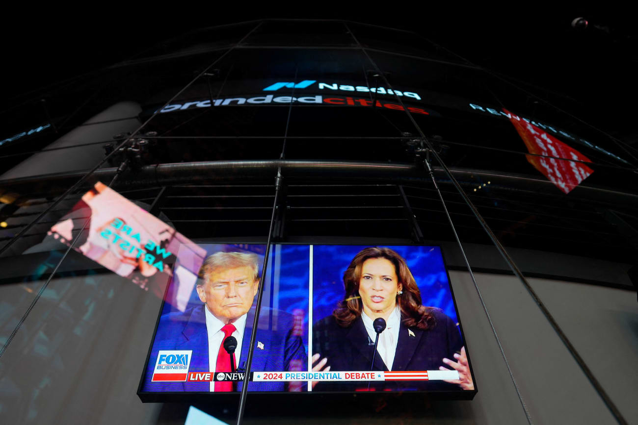 A screen shows the presidential debate between Republican nominee and former President Donald Trump and Democratic nominee and Vice President Kamala Harris outside the Nasdaq MarketSite in New York City, September 10, 2024.