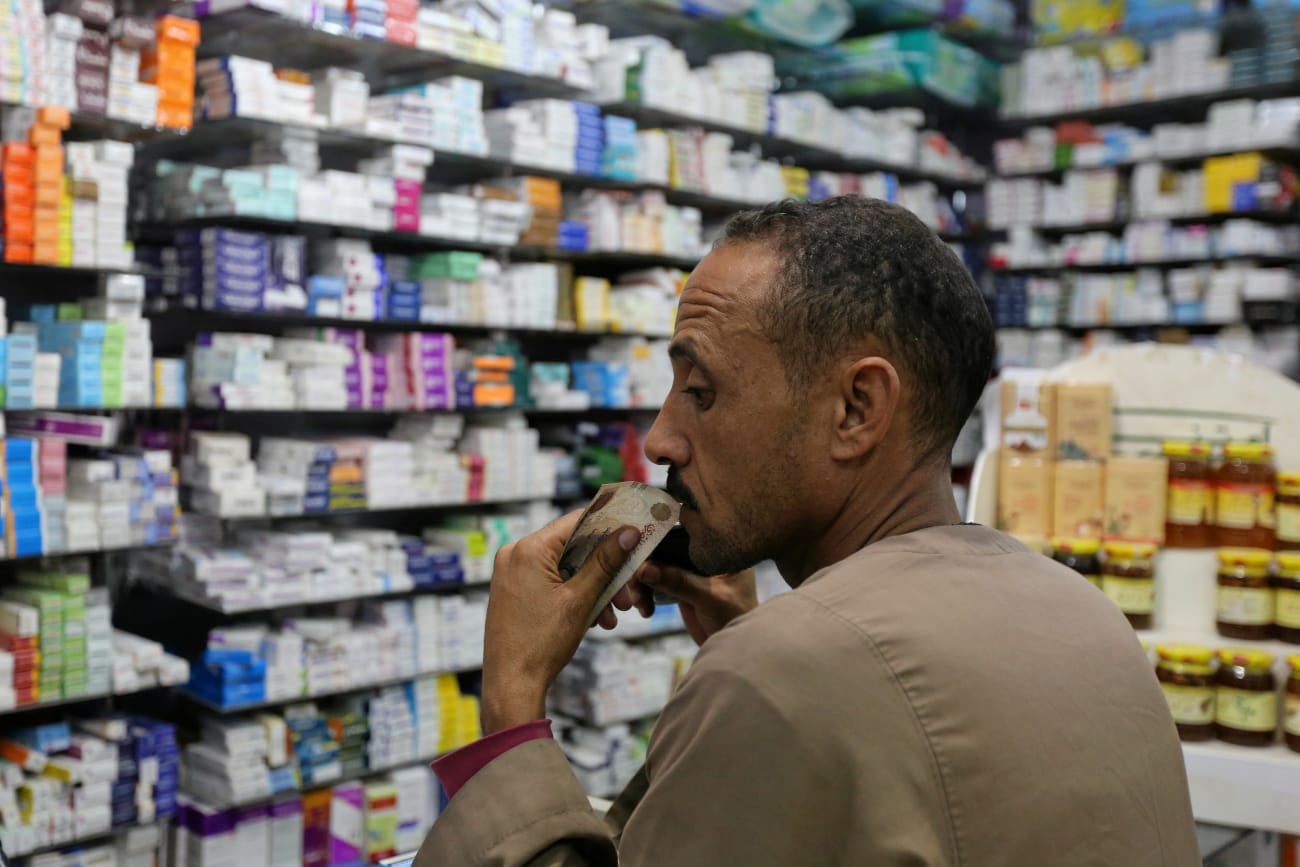 A customer waits for his medicine in a pharmacy, in downtown Cairo, Egypt, on November 17, 2016.