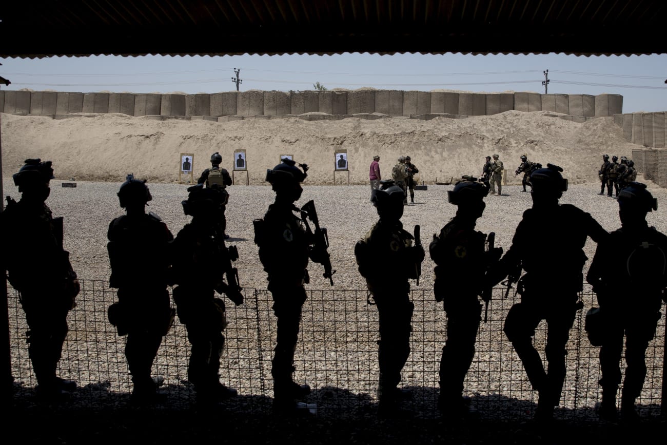 Members of the Iraqi military train at the Counter Terrorism Service training location, as observed by U.S. Defense Secretary Ash Carter in Baghdad