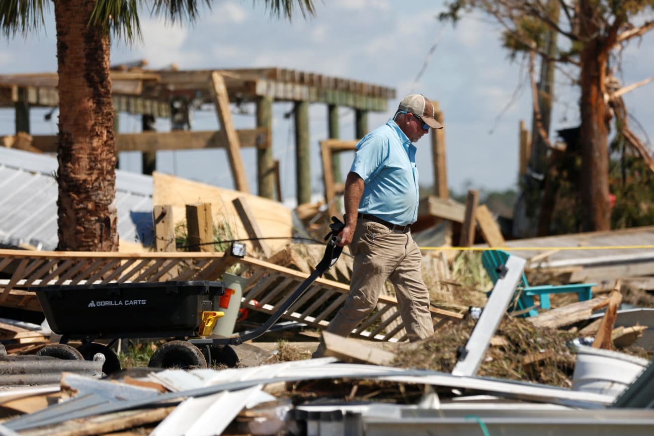A resident of Keaton Beach works to recover their belongings from their home after Hurricane Helene passed through the Florida panhandle.