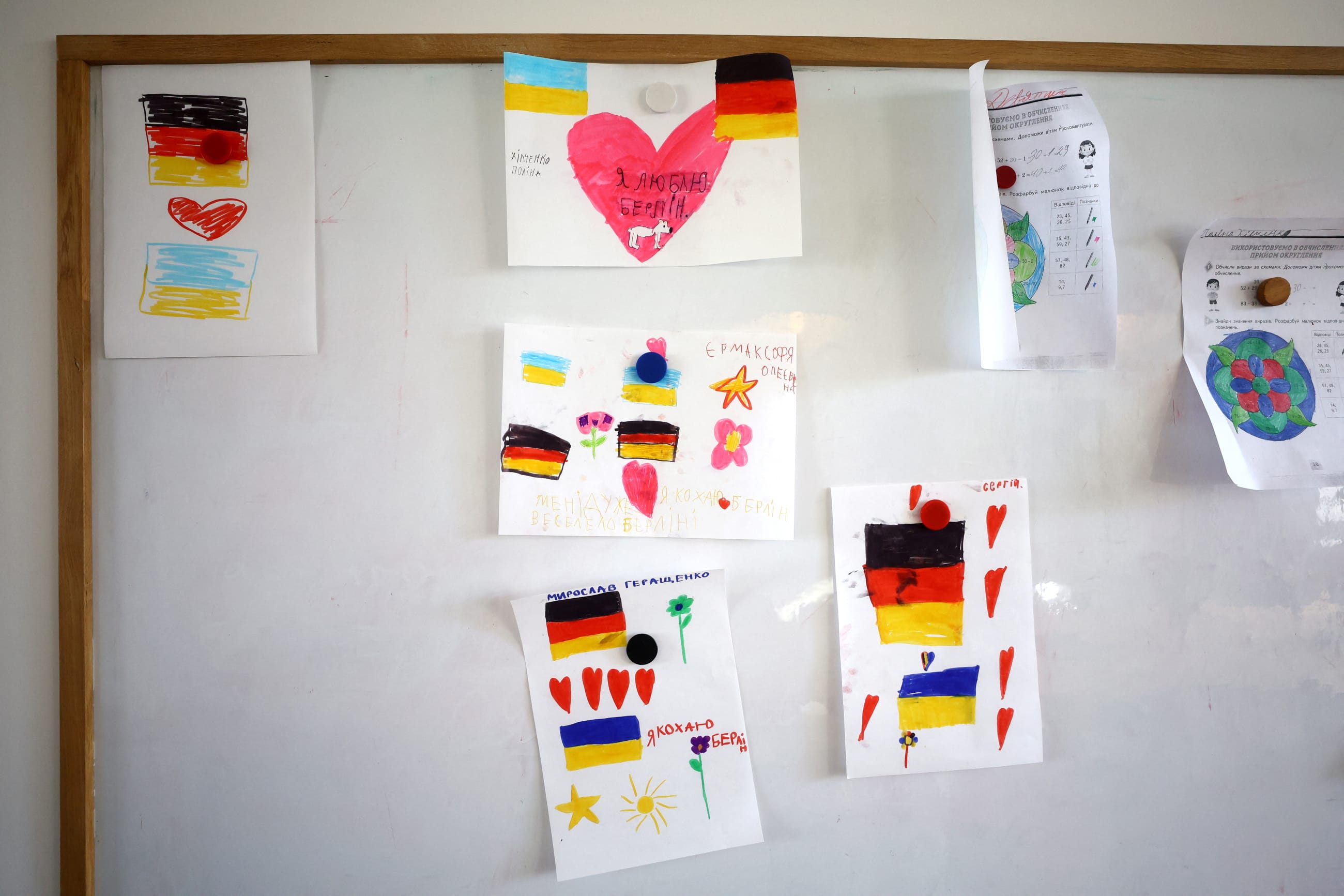 Paintings made by children who fled Ukraine are seen inside "Classroom for Ukraine" a school project launched by Arche as Russia's invasion of Ukraine continues in Berlin, Germany, March 31, 2022.