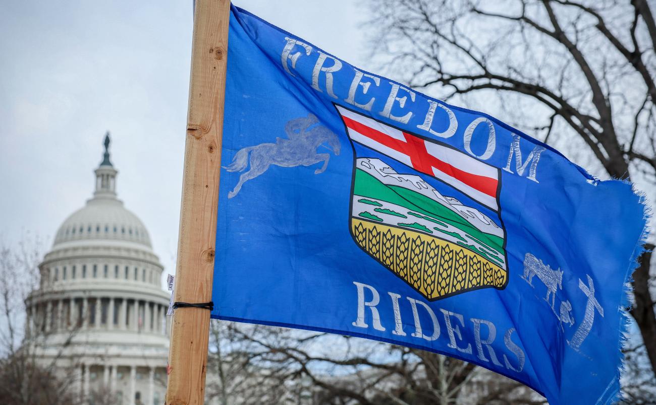 A flag flies from a solo truck from the "The People's Convoy" outside the U.S. Capitol on March 10, 2022.