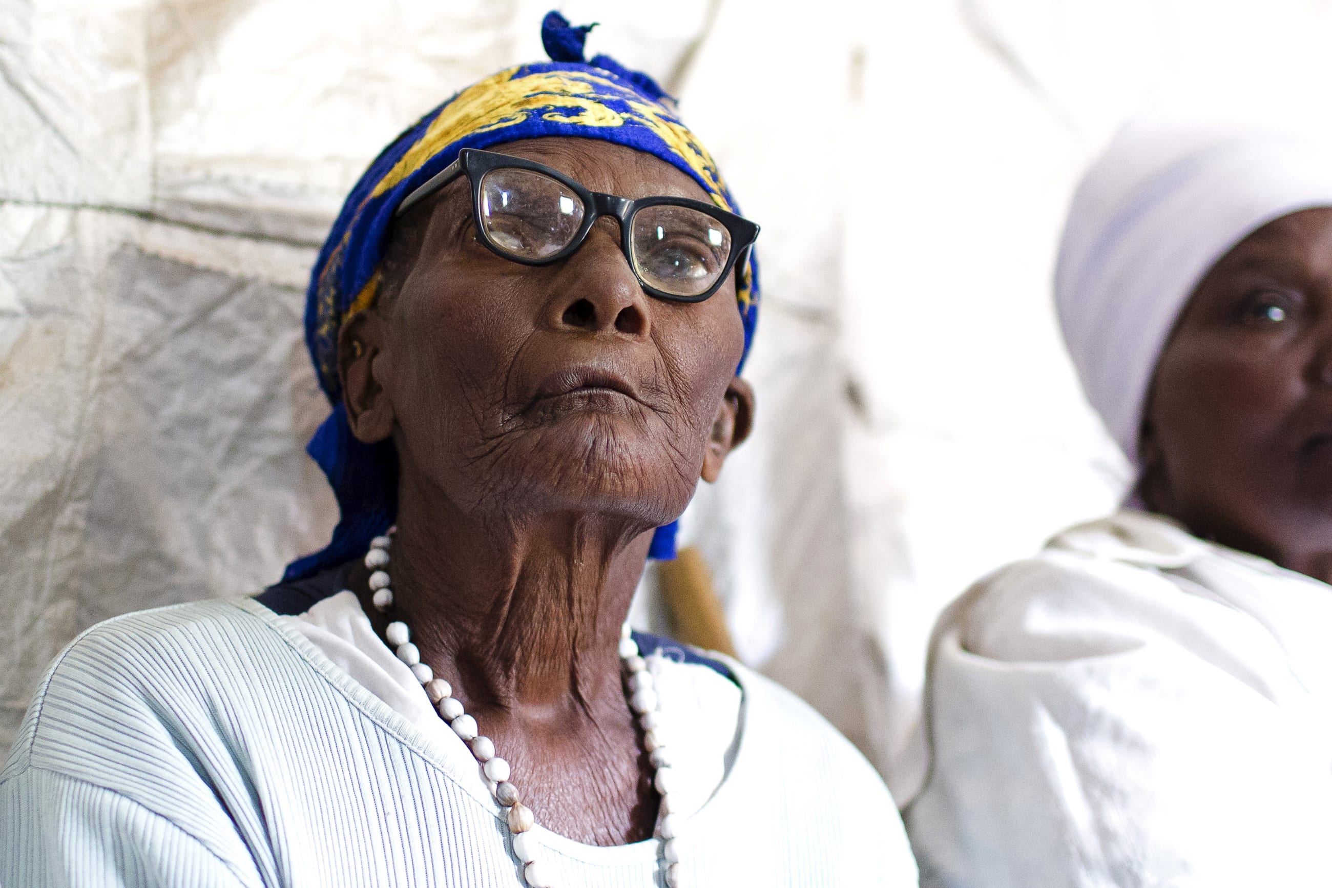 An elderly woman attends a class run by the Ujamaa self-defense program.