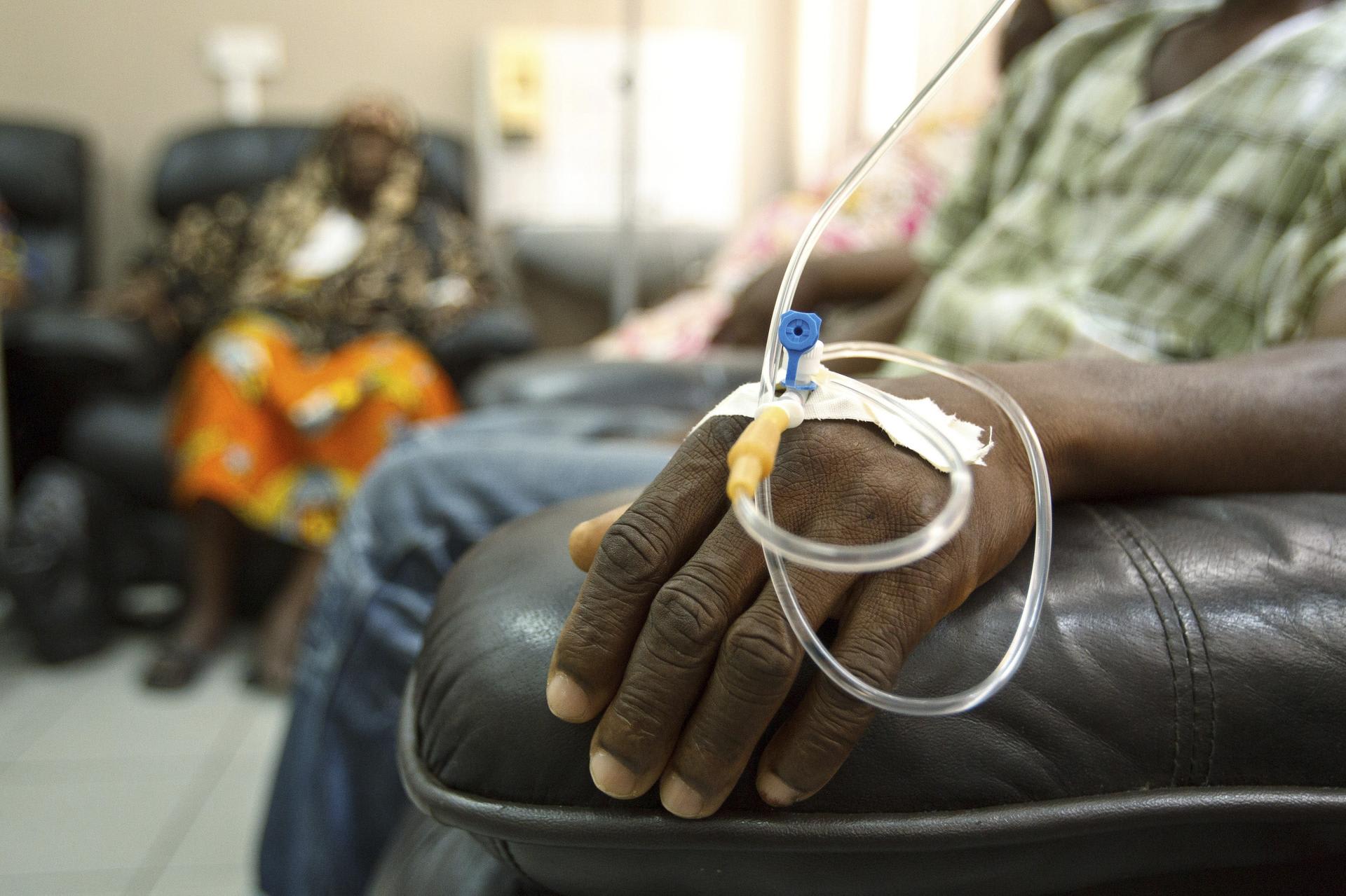 Cancer patients sit in a chemotherapy while receiving treatment at the Korle Bu Teaching Hospital, in Accra, Ghana, on April 24, 2012.