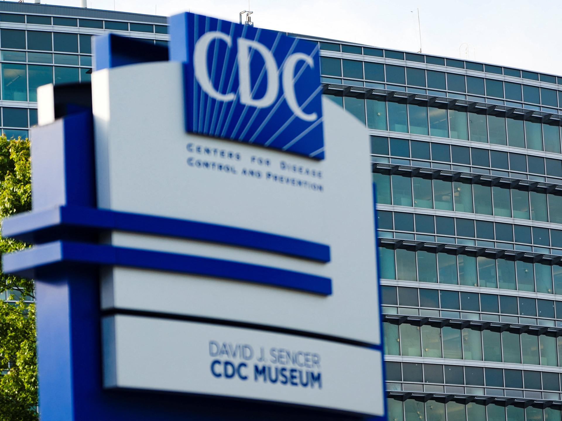 The glass of the Center of Disease Control and Prevention (CDC) building is pockmarked by bullet holes, following a deadly shooting incident, in Atlanta, Georgia, on August 9, 2025.