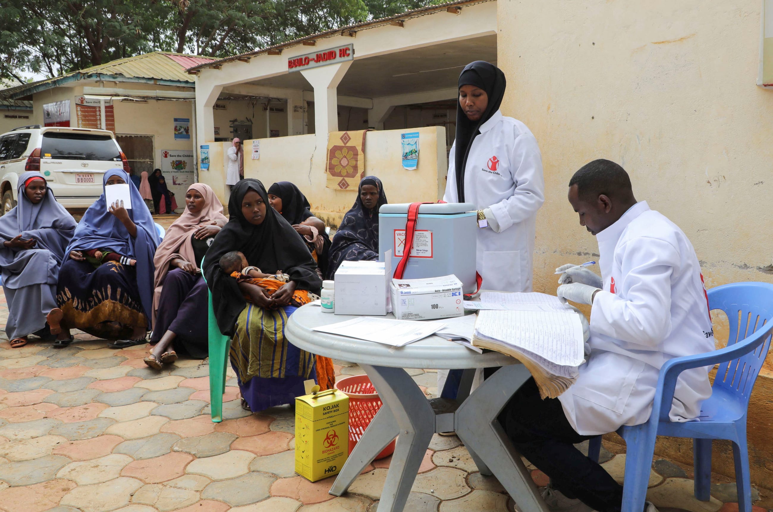 A nurse from Save the Children prepares to administer vaccinations to internally displaced Somali children, in Baidoa, Somalia, on June 25, 2025.