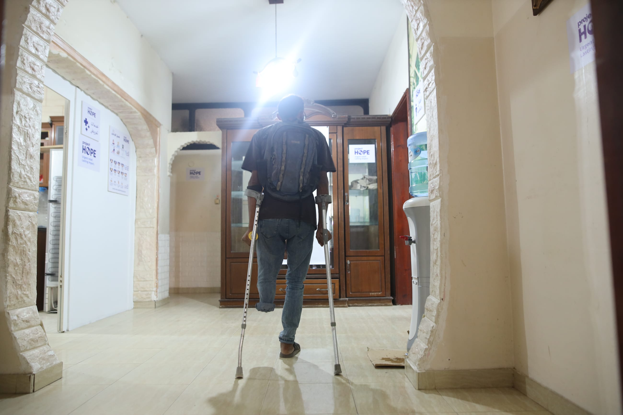 Hasan Zaghloul, 30, is displaced in Deir al-Balah and a patient at Project HOPE's clinic. A tragic injury led to the amputation of his leg, and his wife was killed in an airstrike, leaving Hasan to care for their four children alone. Photo taken August 2025.