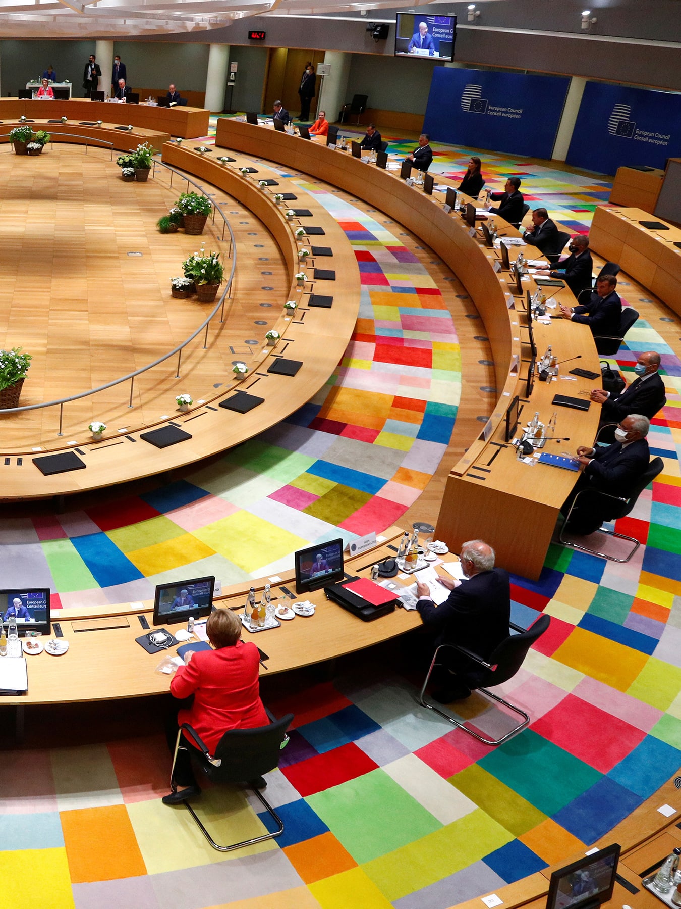 Where policy meets health: European Union leaders take part in the first face-to-face EU summit since the coronavirus disease (COVID-19) outbreak began, in Brussels, Belgium, on July 17, 2020. The photo shows a large round table from above with various leaders seated far apart from one another.