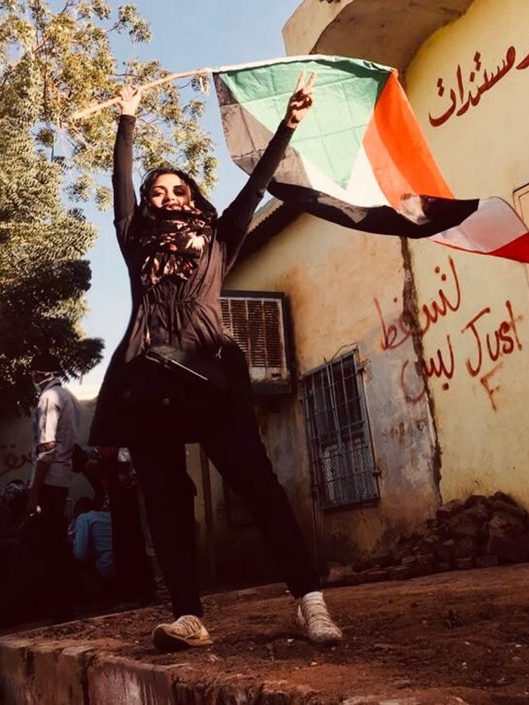 Physician Sarah Khalifa rotesting during first days of the December revolution in Khartoum district of Burri, in Sudan