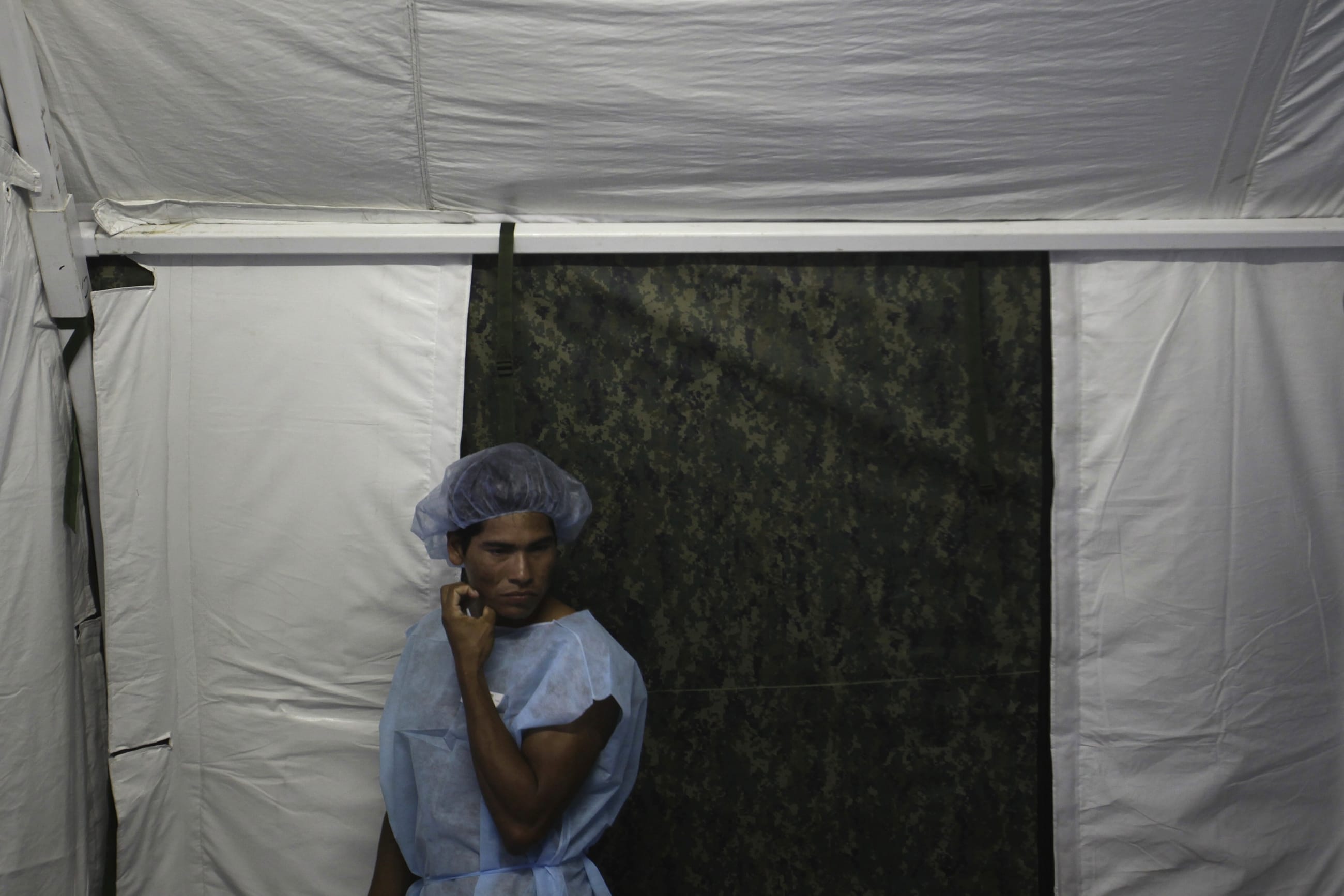 A man from the Yanomamy tribe waits for his surgery at the surgical center at the Cartucho community during a medical expedition in Santa Izabel do Rio Negro, in Amazonas state in northern Brazil, November 8, 2010.