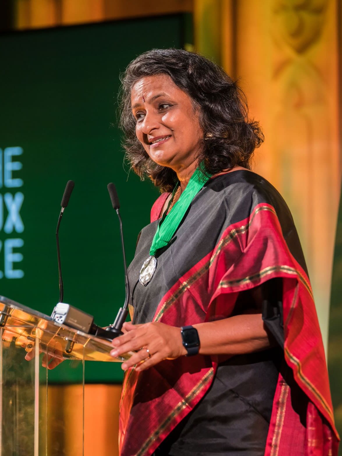 Mukteshwari "Mukti" Bosco, CEO and founder of Healing Fields Foundation, accepts the 2022 Roux Prize at Guildhall, in London, England, on October 11, 2022. Photo courtesy of University of Washington