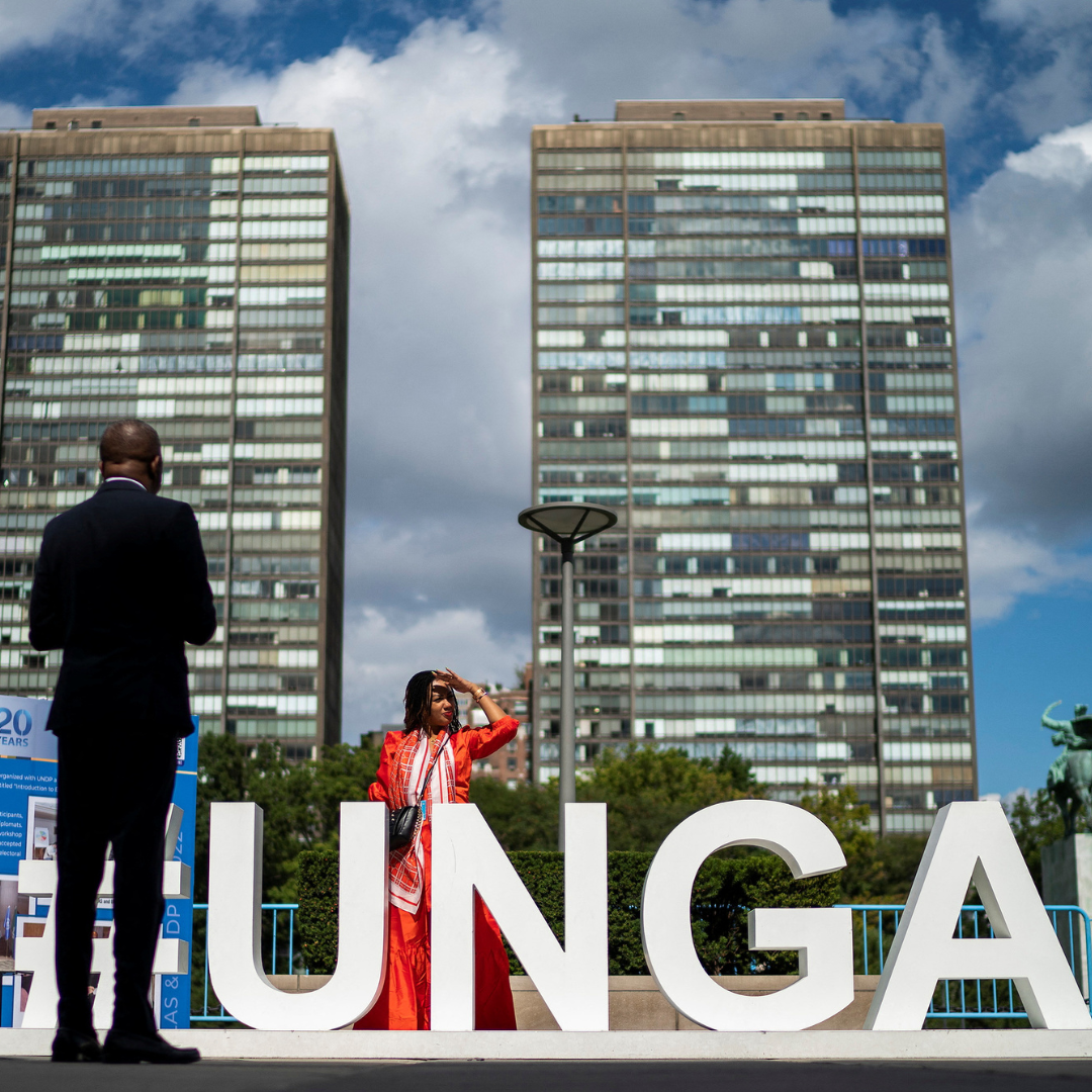People stand outside the 77th Session of the United Nations General Assembly at UN Headquarters in New York, on September 20, 2022. 