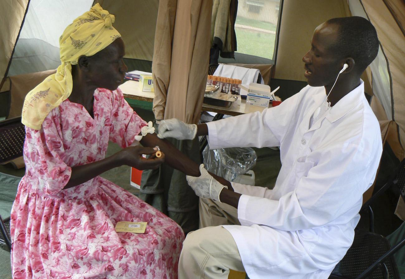 A woman is given a free HIV/AIDS test in Lira, northern Uganda, September 9, 2007.