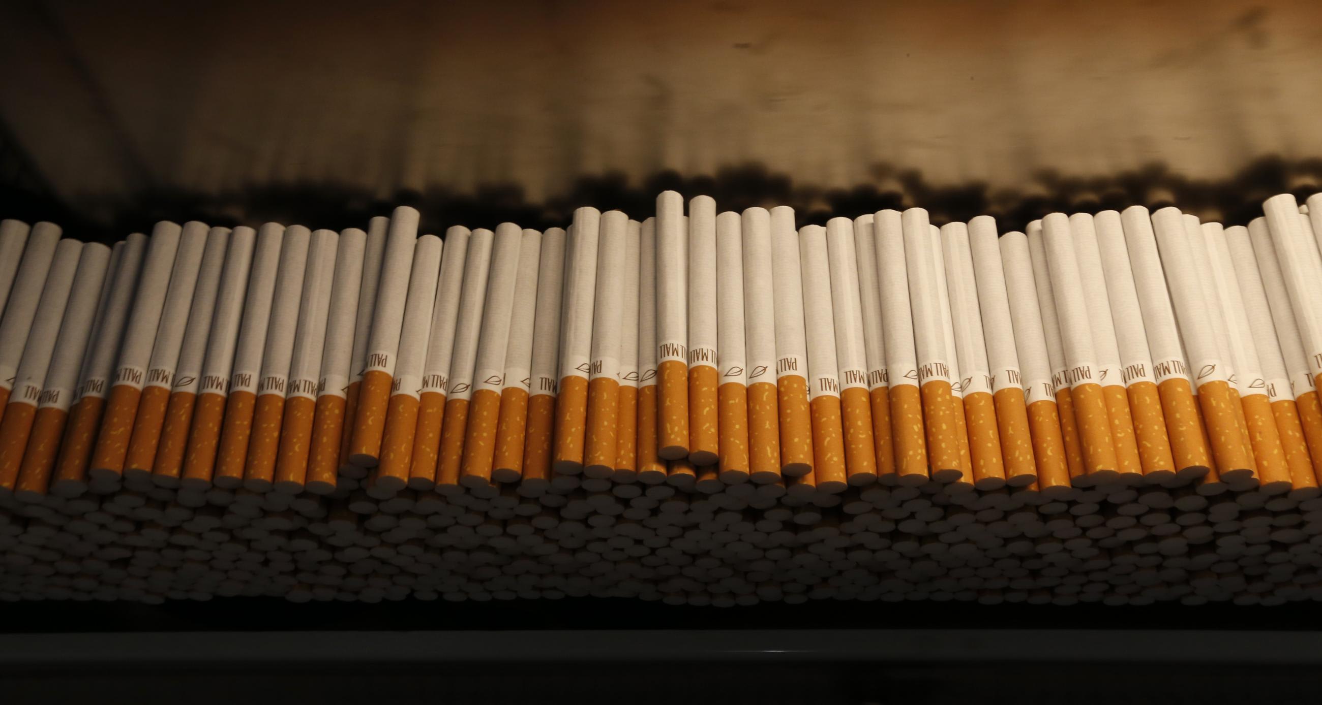 Cigarettes are piled during the manufacturing process in the&nbsp;British&nbsp;American&nbsp;Tobacco&nbsp;Cigarette Factory.