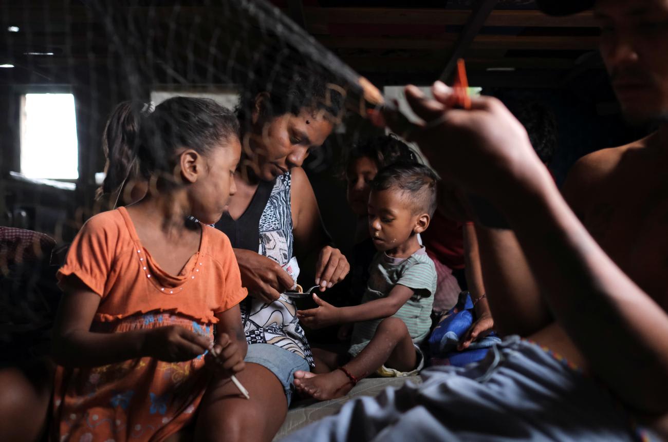 Adelaida Marquez serves&nbsp;ready-to-use&nbsp;therapeutic&nbsp;food&nbsp;to her 15-month-old son who has been diagnosed with malnutrition.