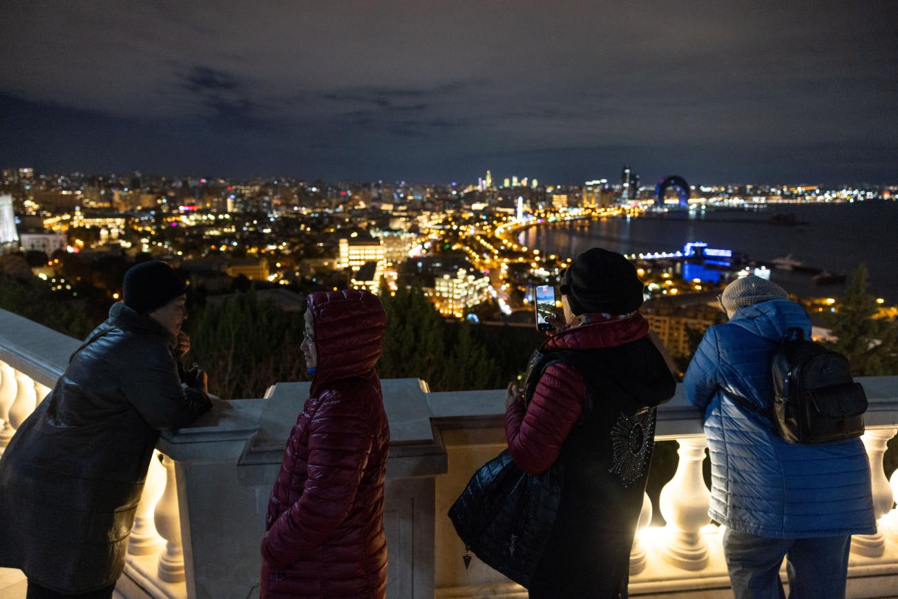 People&nbsp;look out at Baku's skyline as the city hosts the United Nations&nbsp;Climate&nbsp;Change&nbsp;Conference (COP29), in Azerbaijan, on November 14, 2024.