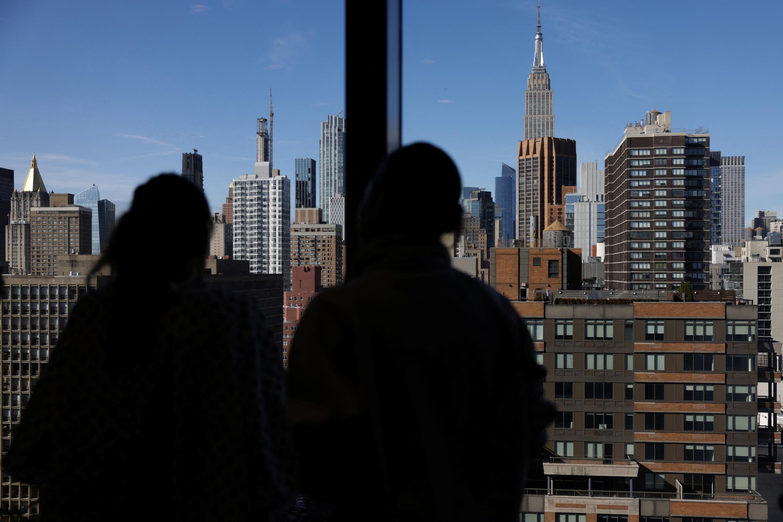 A woman who received the first fully robotic double lung transplant looks out the window with her nurse, at NYU Langone&nbsp;Health&nbsp;Center Transplant Institute, in New York City,&nbsp;on November 19, 2024.