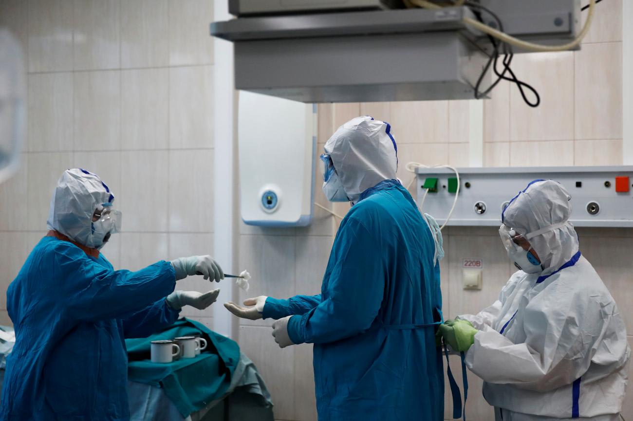 Islam Muradov, MD,&nbsp;prepares to perform an emergency&nbsp;surgery on a patient with COVID-19,&nbsp;in the operating room of the City Clinical Hospital Number 15, in Moscow, Russia, on&nbsp;May 25, 2020.