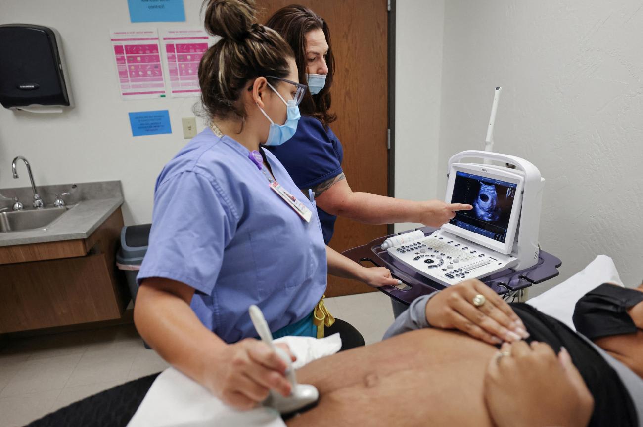 An ultrasound sonographer guides a resident during an ultrasound on a patient, before her surgical&nbsp;abortion&nbsp;at the Trust Women clinic in Oklahoma City, Oklahoma, on December 6, 2021.