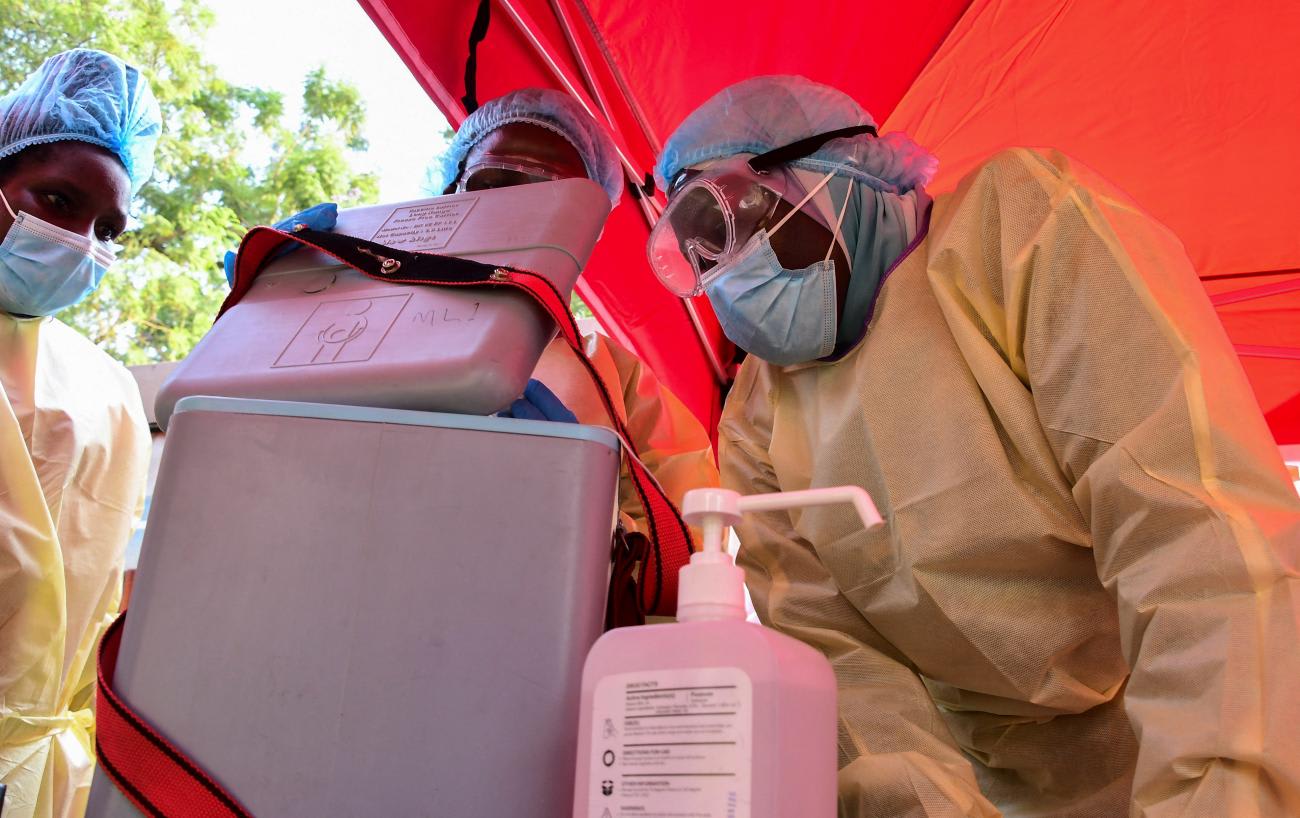 Doctors prepare to vaccinate&nbsp;a close contact of a patient who had tested positive during the launch of the vaccination for the Sudan strain of&nbsp;Ebola&nbsp;virus, in Kampala, Uganda, on February 3, 2025.