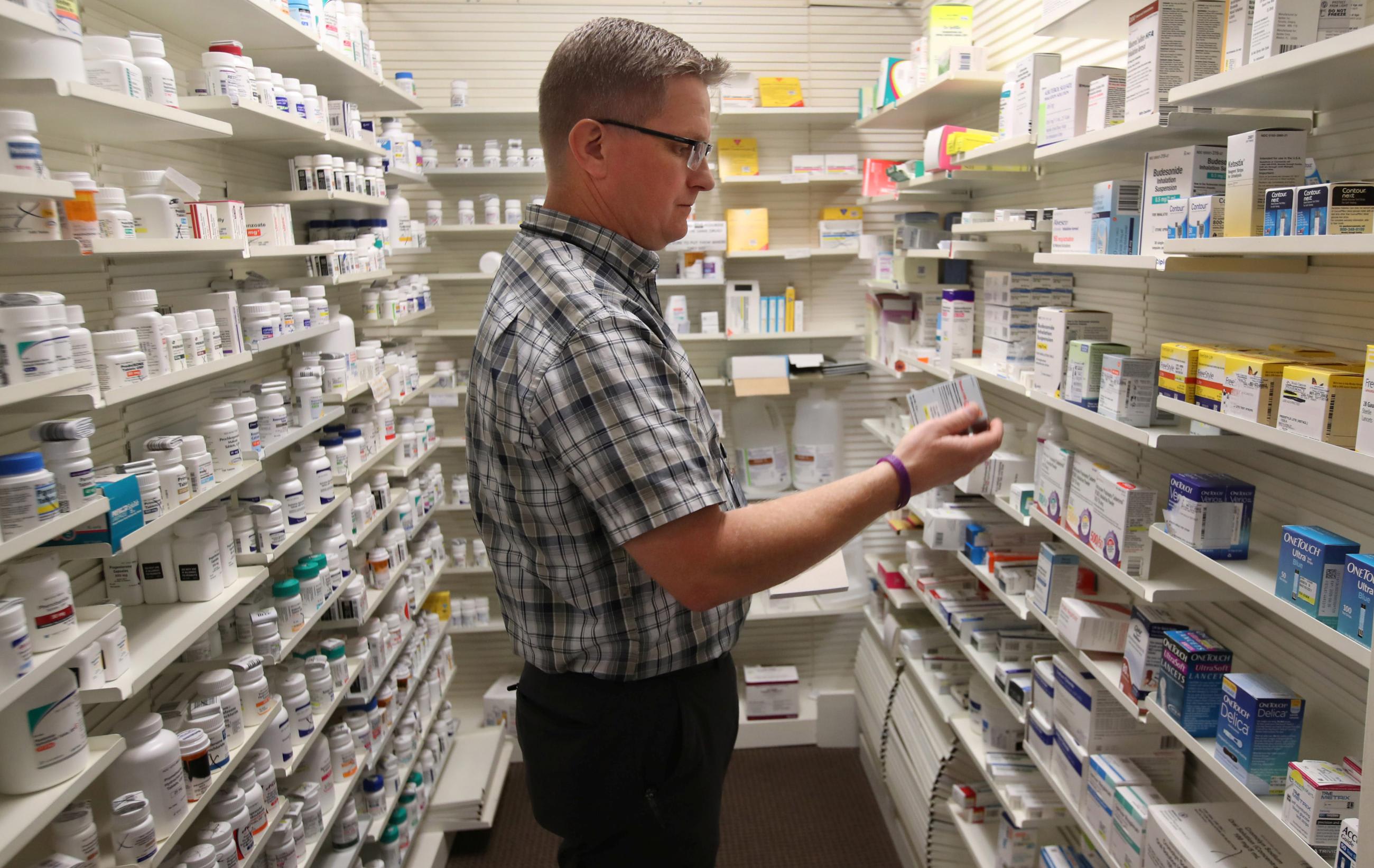 Pharmacist Thomas Jensen looks over a&nbsp;prescription&nbsp;drug at the Rock Canyon pharmacy, in Provo, Utah, on May 9, 2019. 