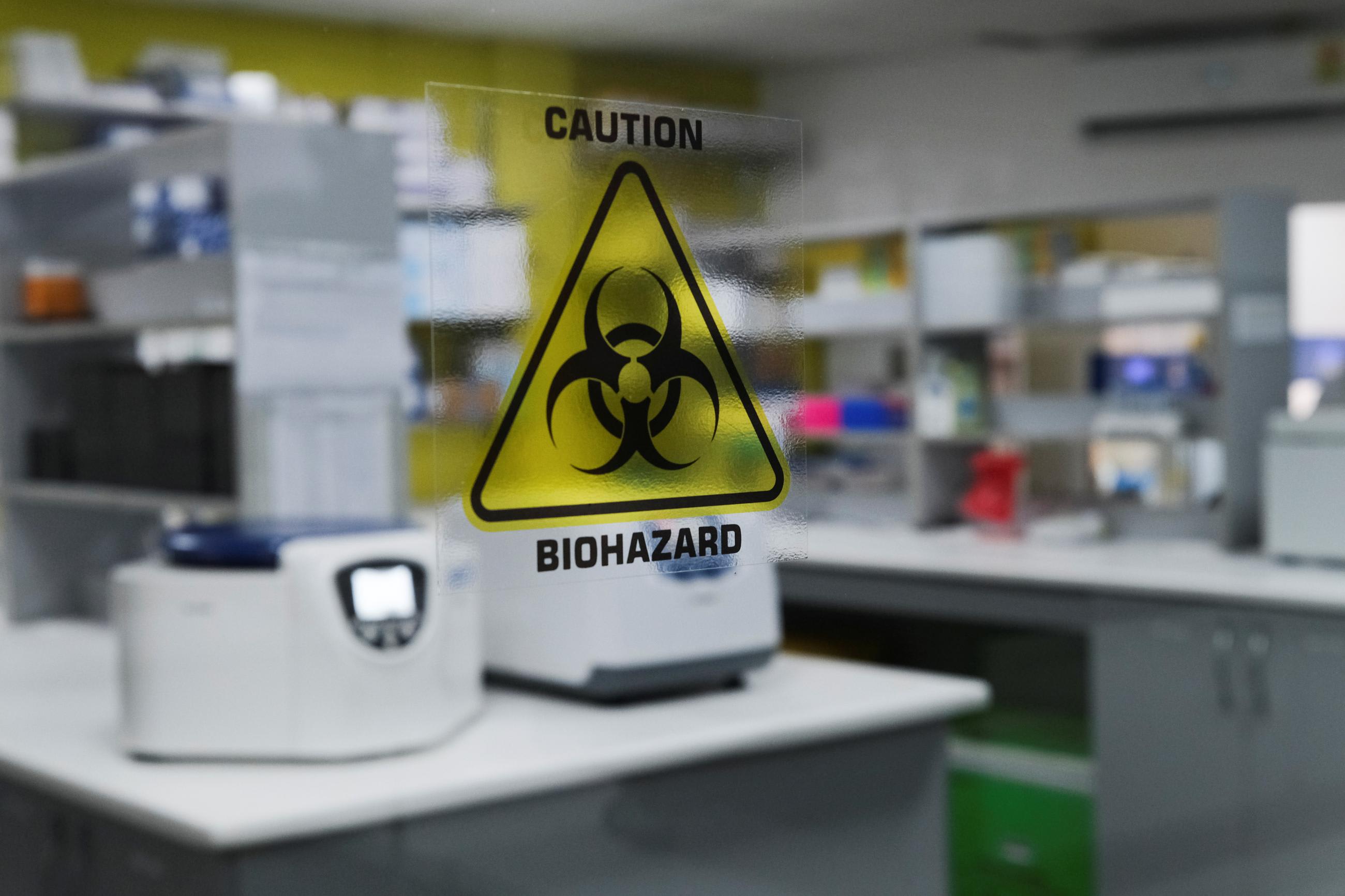 A biohazard warning sign is displayed at the Yemaachi Biotechnology cancer research laboratory, in Accra, Ghana, on May 19, 2022.