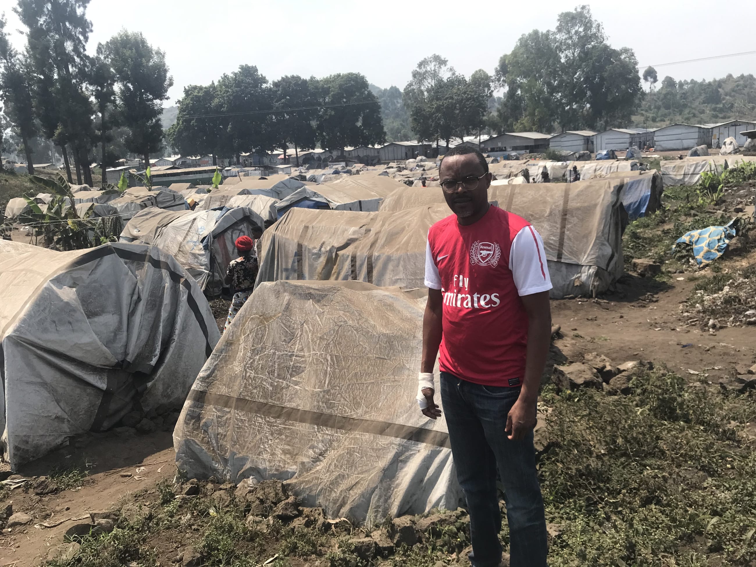 A man stands in the Kanyaruchinya camps, on the outskirts of the city of Goma, Democratic Republic of Congo, on July 29, 2023.
