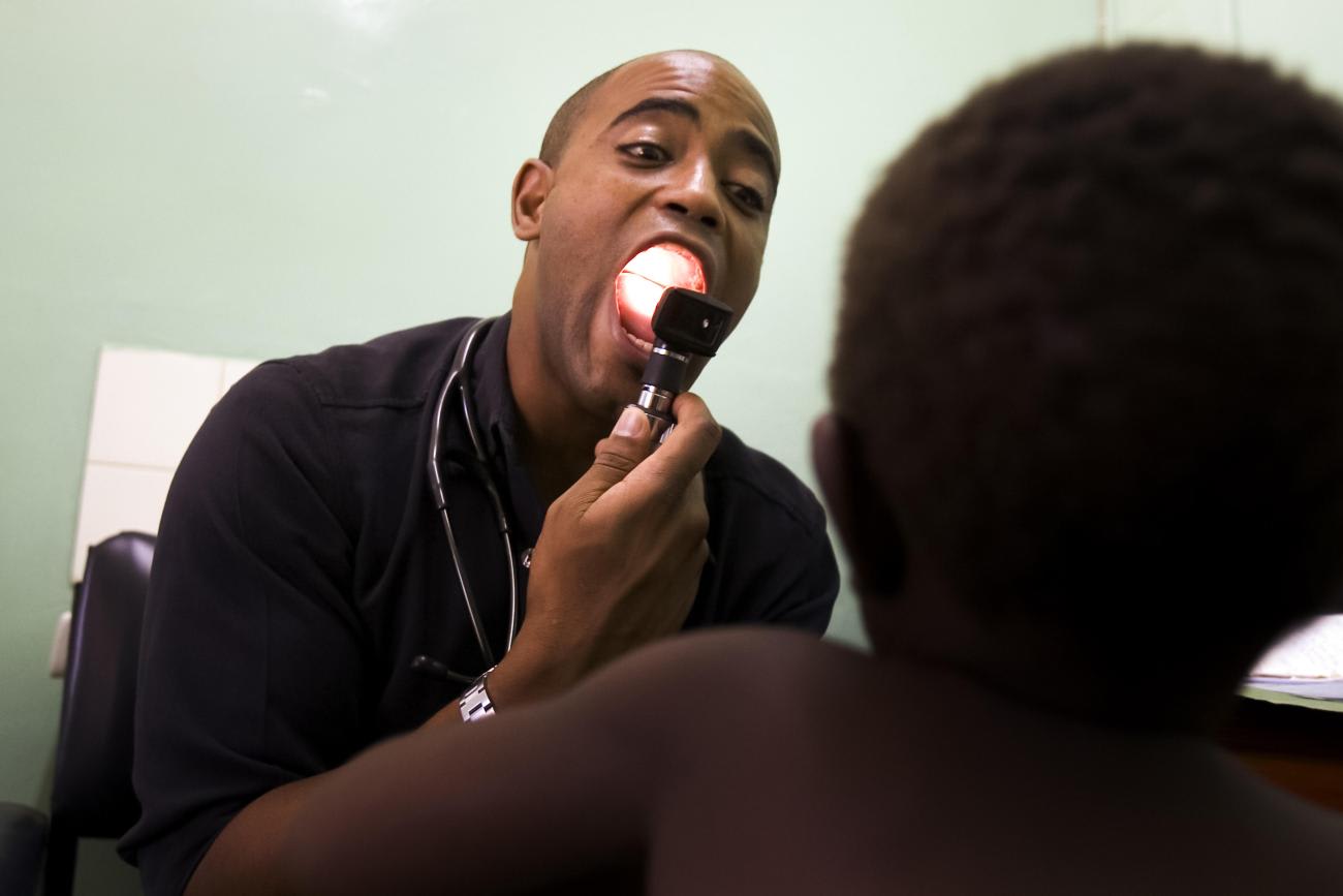 A physician visits with a patient in Malawi, at the Texas Children’s Global Health Network, the largest pediatric HIV treatment program.