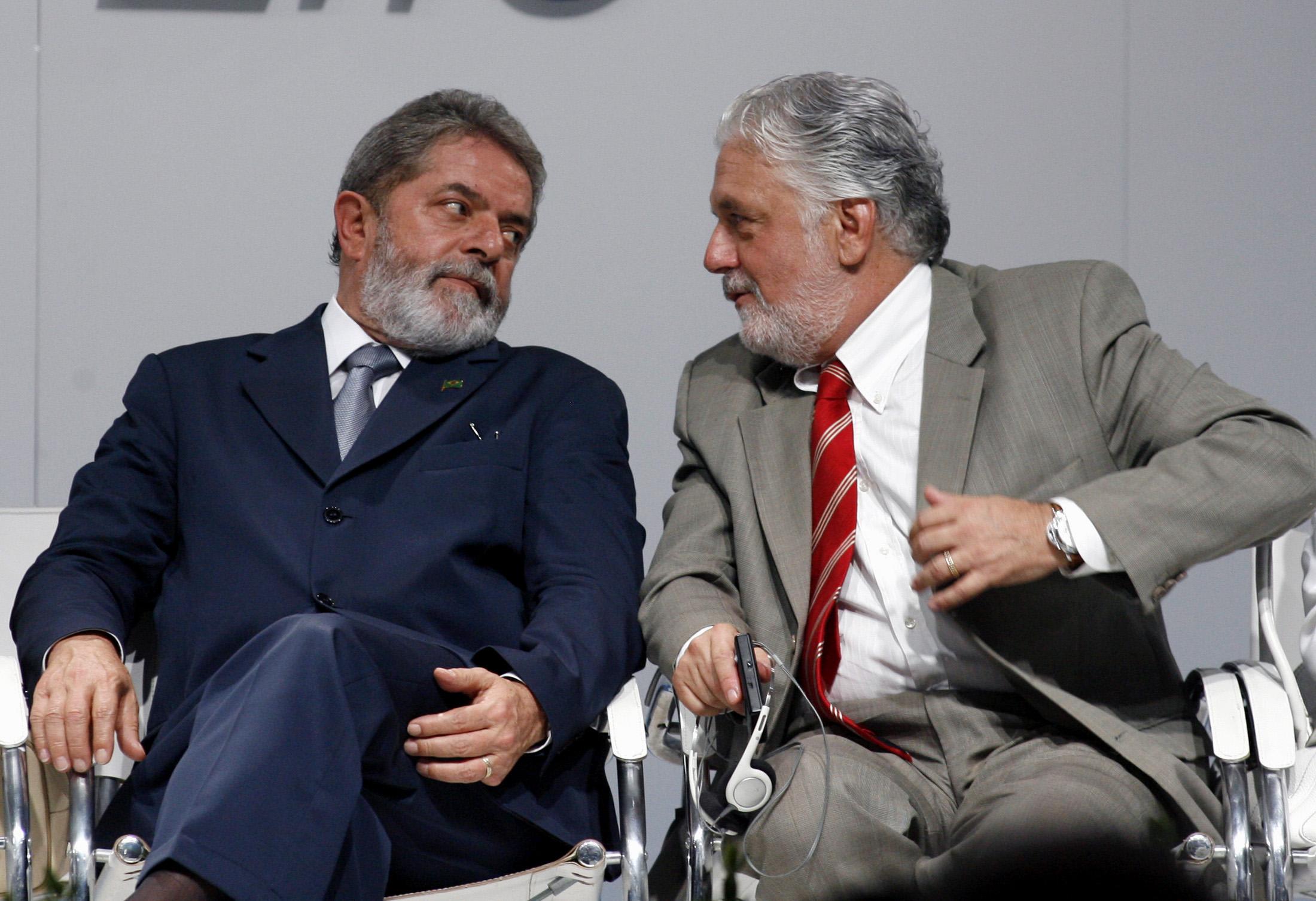 Brazil's President Luiz Inacio Lula da Silva (L) talks to Bahia state Governor Jacques Wagner, during the opening of a new Nestle factory, in Feira de Santana, Bahia, Brazil, on February 9, 2007.