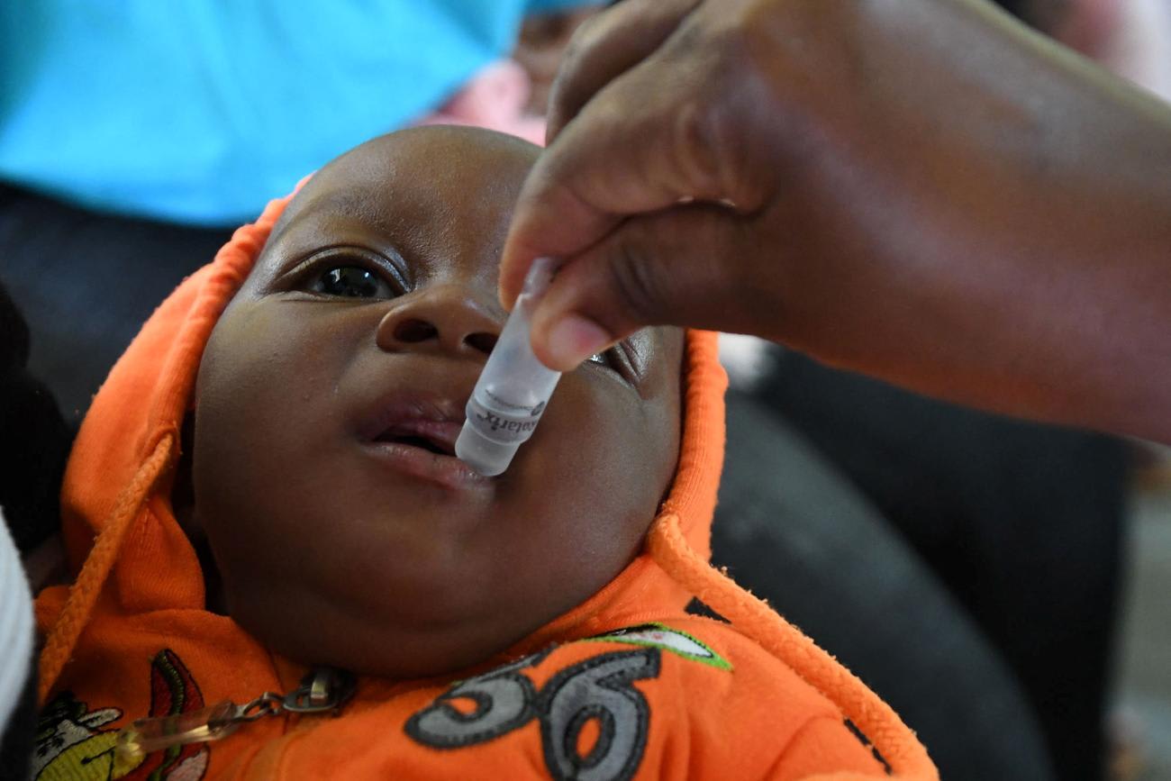 A baby receives a rotavirus vaccination at Fort Portal Regional Referral Hospital in Uganda, November 2021.