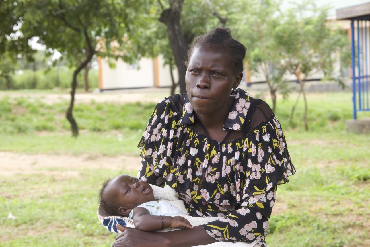 Kezi Flora is a refugee mother of five who regularly makes the 2-hour trip by foot to get her 10-week old baby vaccinated against 13 different diseases. 
