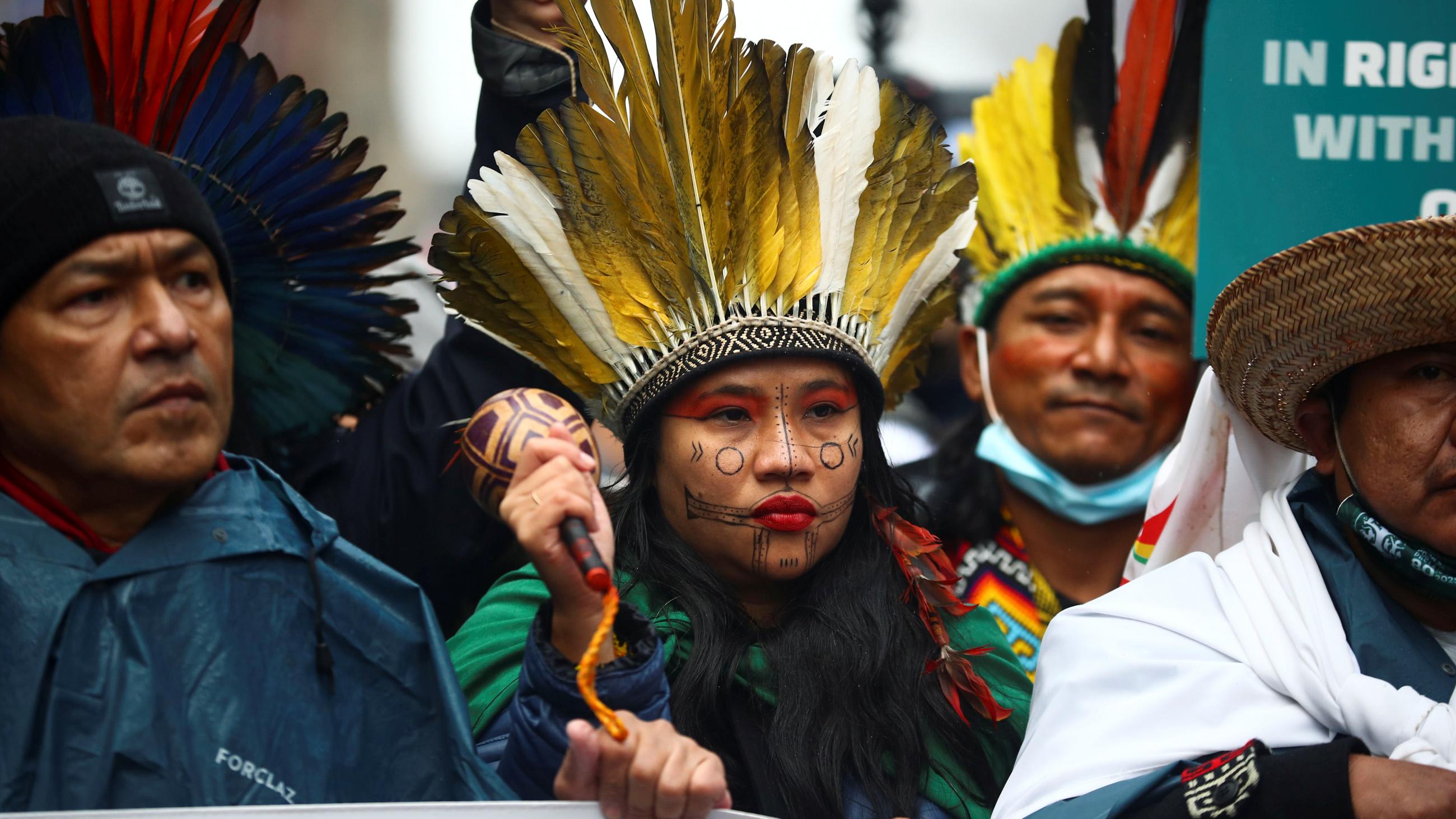 Members of Indigenous Minga attend a protest.