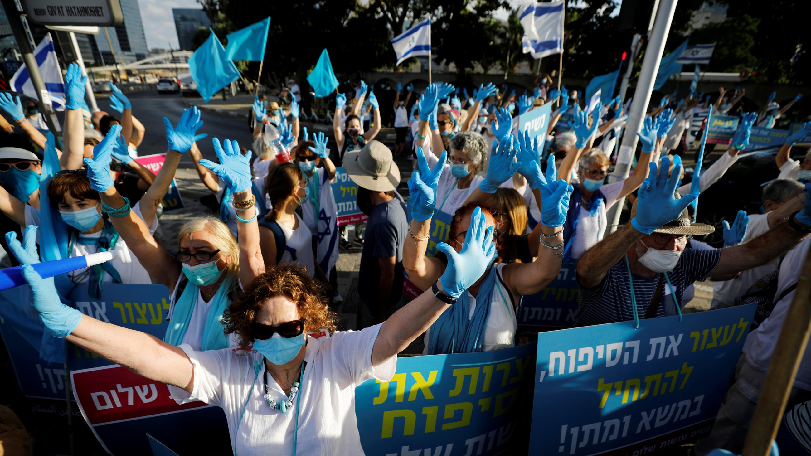 Women take part in a protest, organized by the 