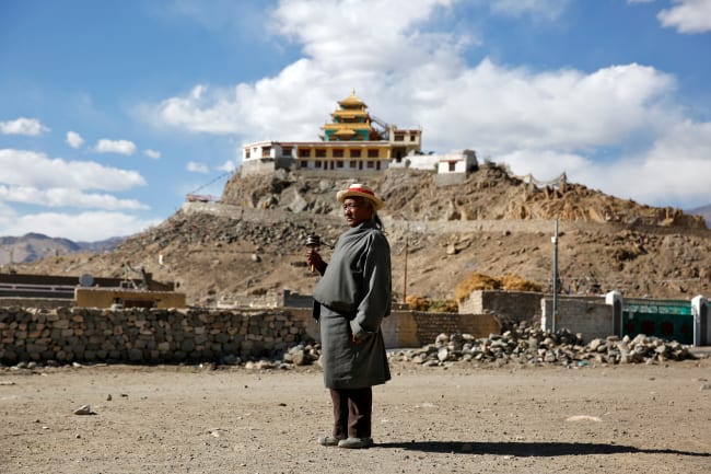 a retired goat herder poses for a photograph in Choklamsar, a village nestled high in the Indian Himalayas, India September 27, 2016. When asked how living in the worlds fastest growing major economy had affected life, Takapa replied: "Traditional values are being lost as we focus on money."
