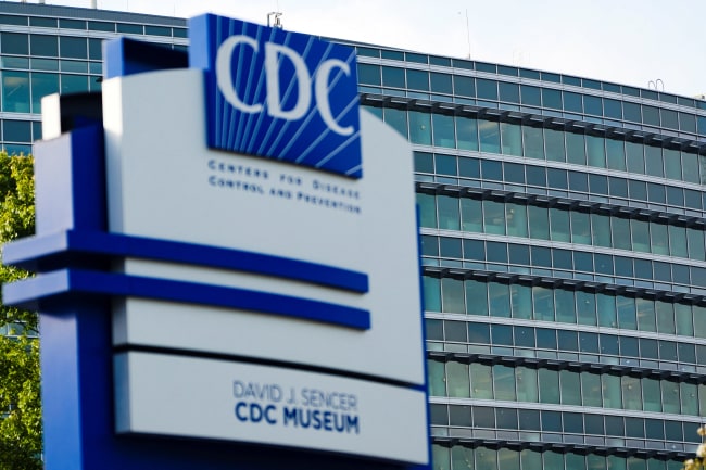 The glass of the Center of Disease Control and Prevention (CDC) building is pockmarked by bullet holes, following a deadly shooting incident, in Atlanta, Georgia, on August 9, 2025.