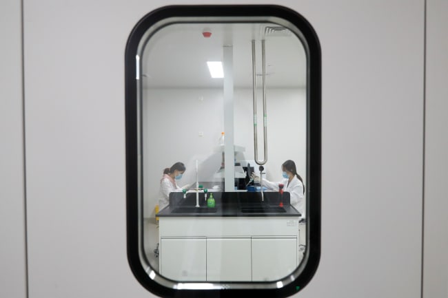 Women work in a laboratory of Chinese vaccine maker Sinovac Biotech, developing an experimental COVID-19 vaccine, during a government-organized media tour, in Beijing, China, on September 24, 2020.