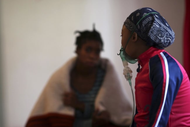 HIV patients chat at Nkosi's Haven, south of Johannesburg, South Africa, on November 28, 2014.