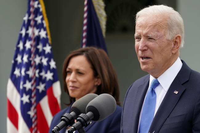 U.S. President Joe Biden, accompanied by Vice President Kamala Harris, speaks about the coronavirus disease (COVID-19) response and the vaccination program from the Rose Garden of the White House in Washington, U.S., May 13, 2021.