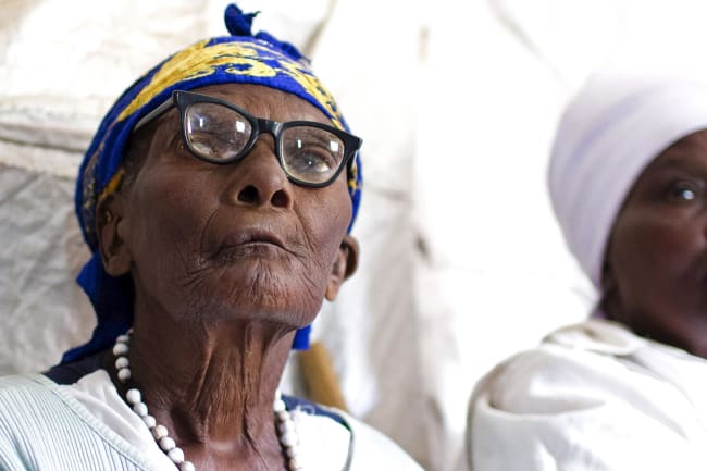 An elderly woman attends a class run by the Ujamaa self-defense program.