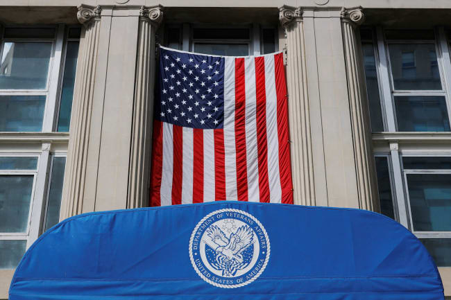 The seal for the Department of Veterans Affairs stands at the door of its headquarters, in Washington, DC, on February 20, 2025.