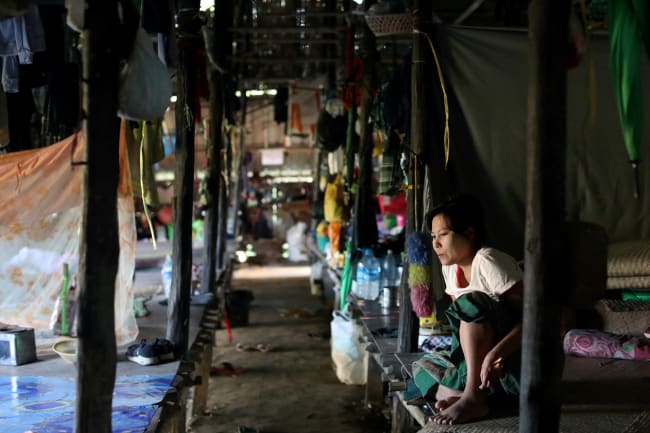 A patient rests in her bedroom in National League for Democracy's AIDS center, in Yangon, Myanmar, on November 27, 2019.