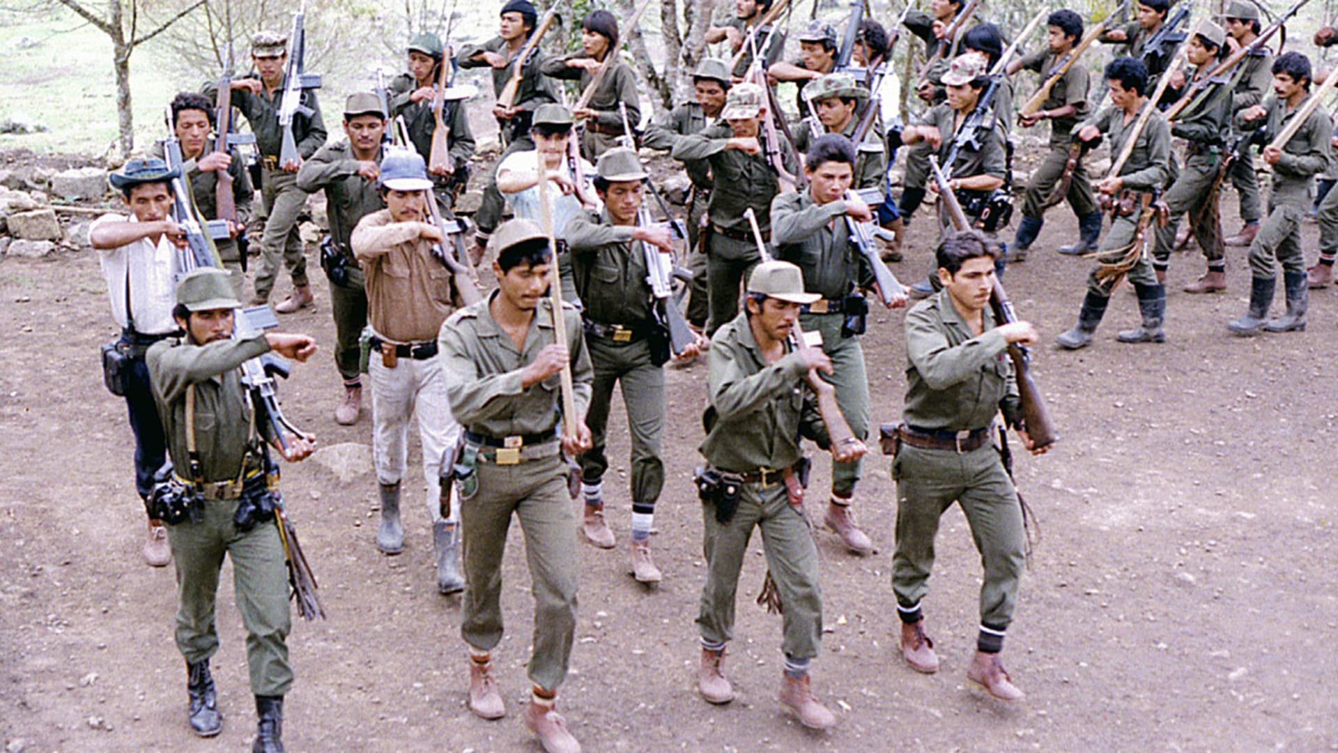 Members of the FARC perform military drills at a training camp in the Colombian countryside. Stringer/AFP/Getty Images