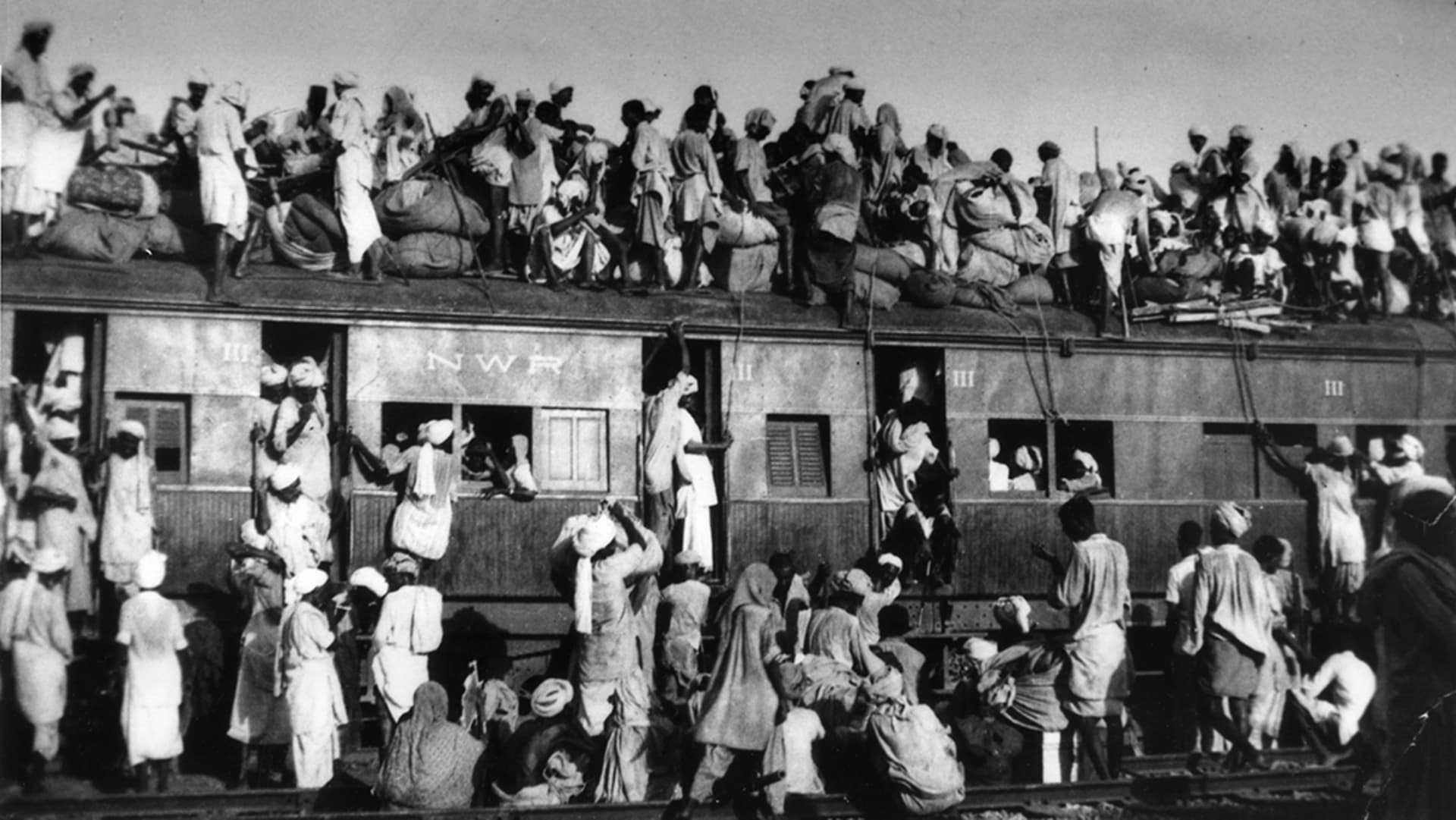 Muslim refugees attempt to flee India after partition in 1947. AP Photo