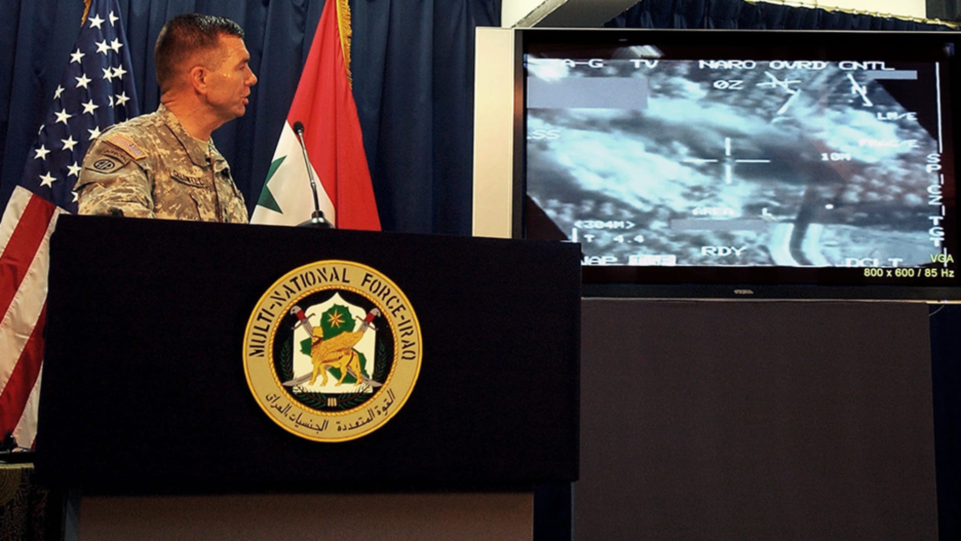 Major General Bill Caldwell presents satellite images of the U.S air strike that killed al-Qaeda leader Abu Musab al-Zarqawi. 
