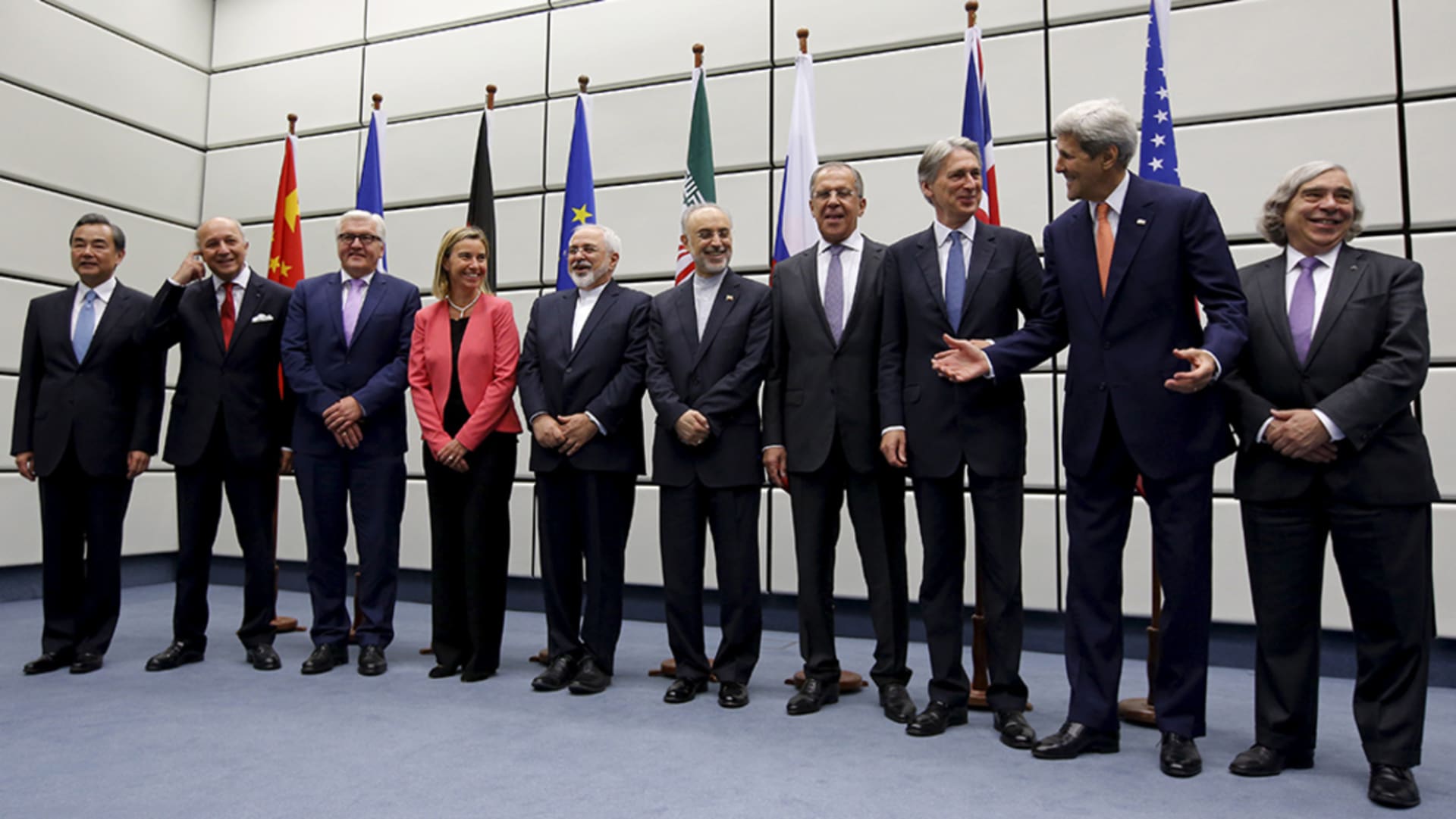 Officials from China, France, Germany, Iran, Russia, the United Kingdom, the United States, and the European Union gather after finalizing the Iran nuclear agreement. 