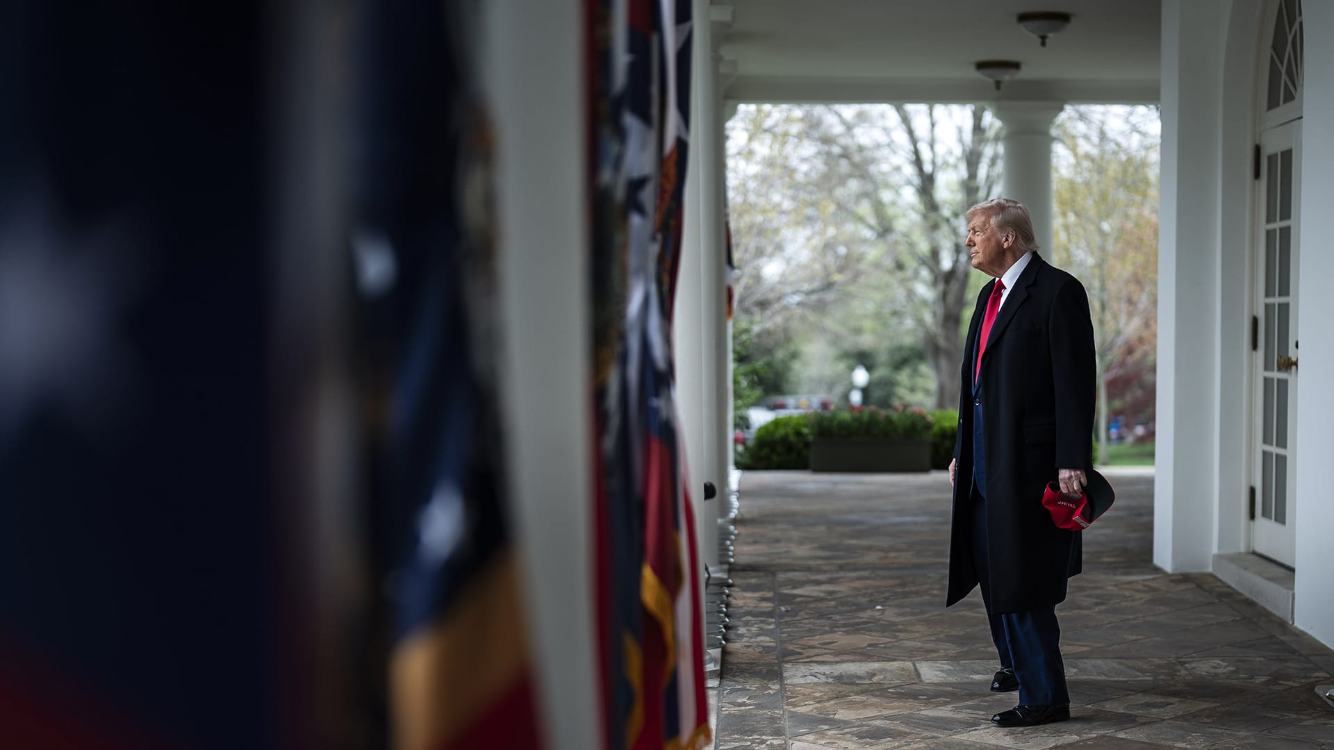 Image of President Trump about to walk onto the Rose Garden.