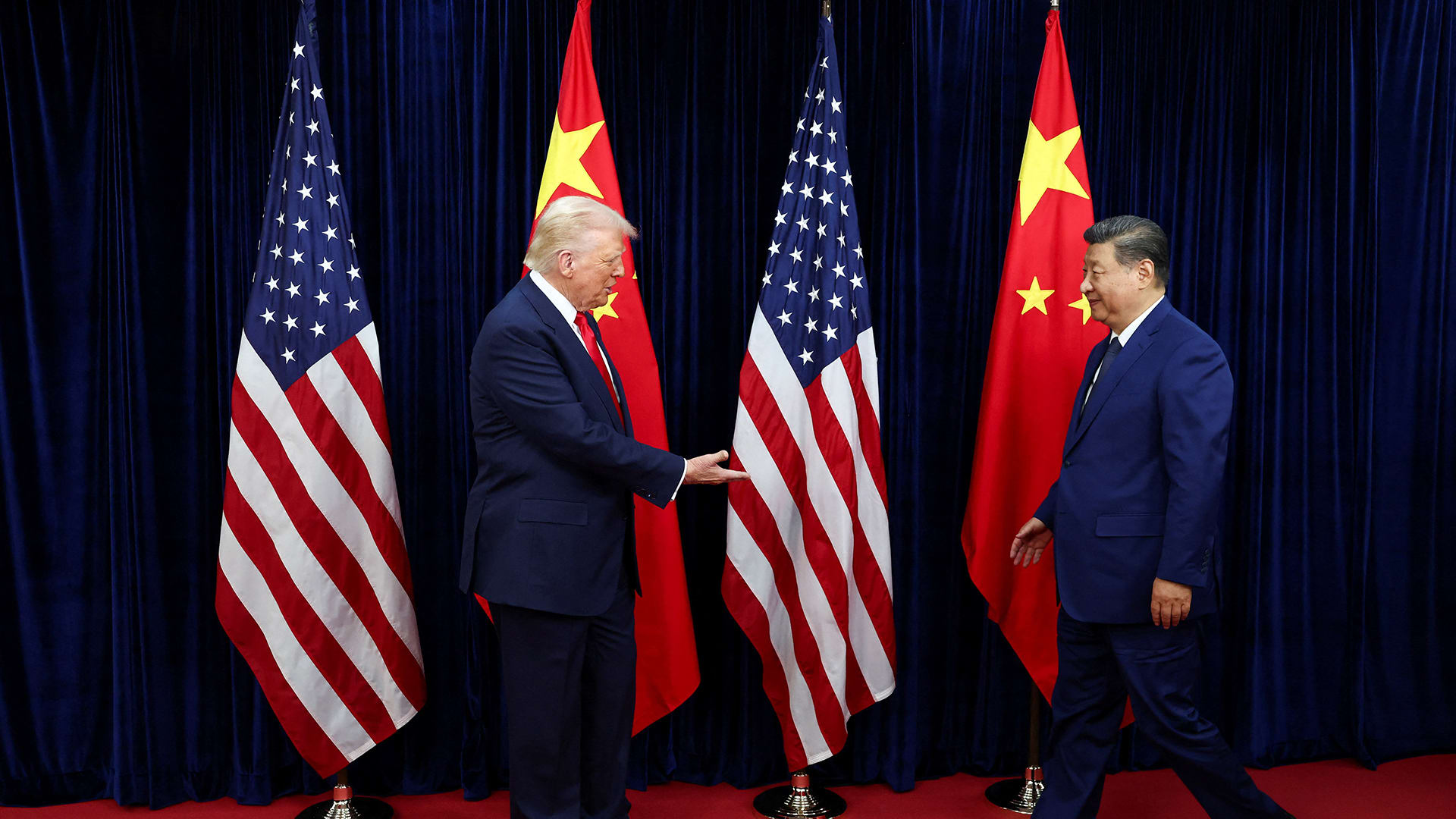 Trump and Xi shake hands on sidelines of APEC 2025 in Busan, South Korea.