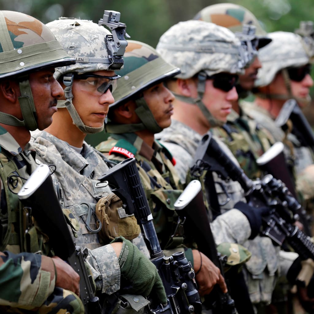 <p>Indian and U.S. army soldiers take part in an Indo-US army joint combat exercise in Ranikhet, in the Himalayan state of Uttarakhand, India, September 25, 2016.</p>
