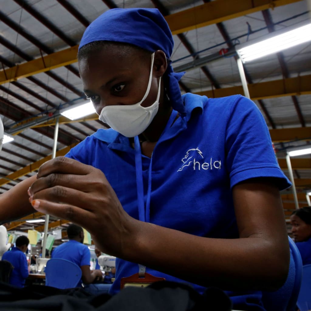 <p>A worker sews at an export processing zone factory in Athi River, Kenya.</p>